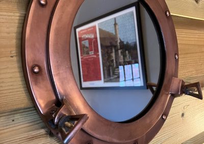 Porthole feature mirror Top Ship Porlock 400x284 - Gallery